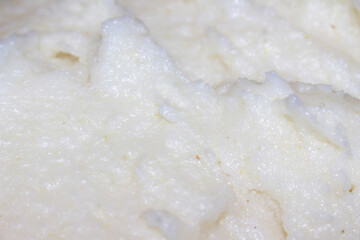 Frame Filled with White Polenta. White Polenta Texture Close-up. Abstract Polenta Background.