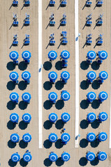 Aerial photo documentation of the beach in Versilia umbrellas aligned at the beginning of summer,