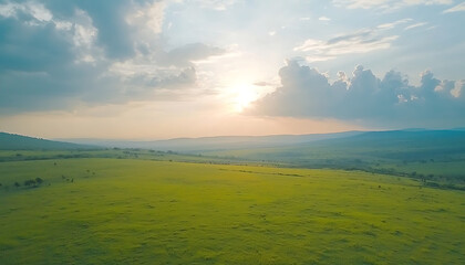 Obraz premium Sunset over African savanna grassland.
