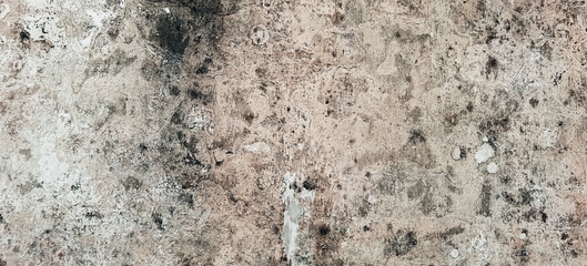 Distressed wall texture featuring irregular patterns and weathered appearance