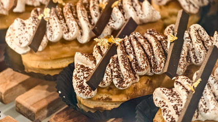 Exquisite Close-Up of Elegant Pastries with Whipped Cream and Chocolate
