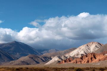 stunning mountain ridge in argentina under dramatic storm clouds showcasing natural symmetry