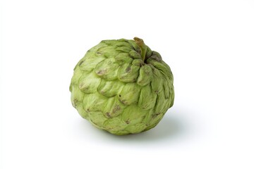Fototapeta premium A single cherimoya fruit, green and textured, sits against a bright white background.