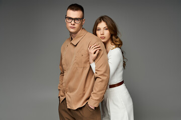 Elegant couple exudes romance in a modern studio setting surrounded by love and joy