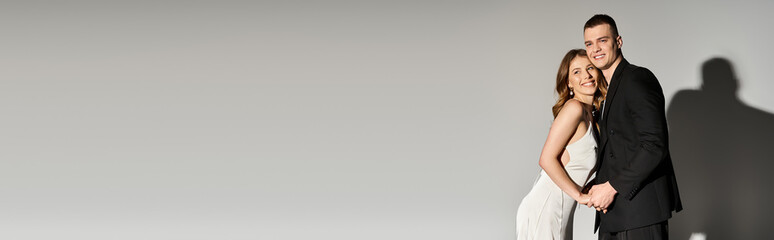 Elegant couple celebrates their romantic union in a contemporary setting filled with love and joy