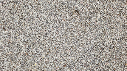 Uniform Covering of Small Pebbles in Neutral Tones Forming a Textured Surface