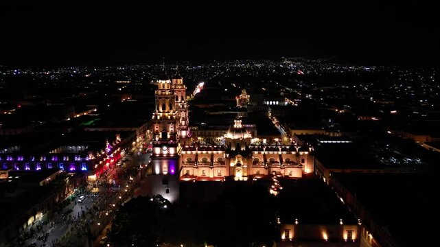Morelia Cathedral in the historic center. Cathedral lighting ceremony. Drone shot.