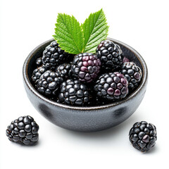 A small bowl filled with fresh blackberries, highlighting their deep color and fresh texture, isolated on a white background