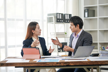 Business Professionals Discussing Strategy in Office