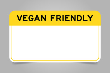 Label banner that have yellow headline with word vegan friendly and white copy space, on gray background