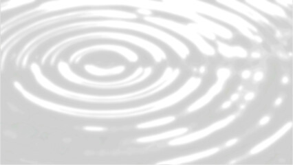 A delicate dance of ripples spreading across a serene and calming white surface