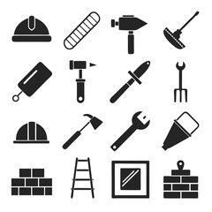 Obraz premium Silhouetted construction tools and building materials in vector style