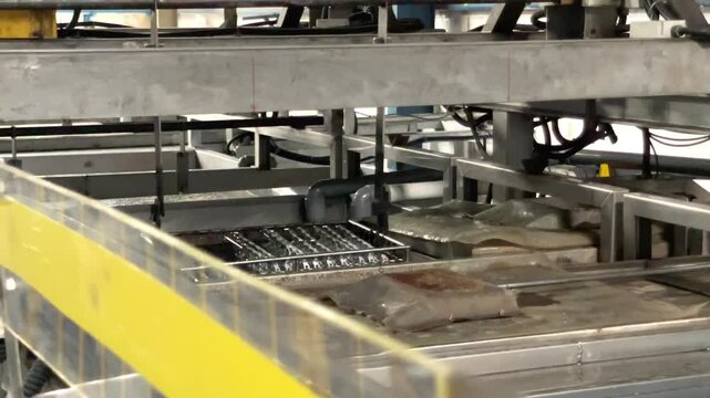 Automated Machine Dipping Motorcycle Parts in Chemical Bath for Surface Treatment