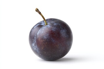 Obraz premium A single ripe plum, dark purple with a bluish hue, sits on a bright white background.