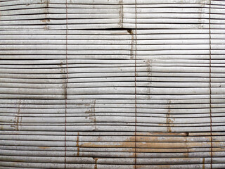 Fototapeta premium brown bamboo surface horizontal texture. Natural bamboo wallpaper. bamboo slat wall background