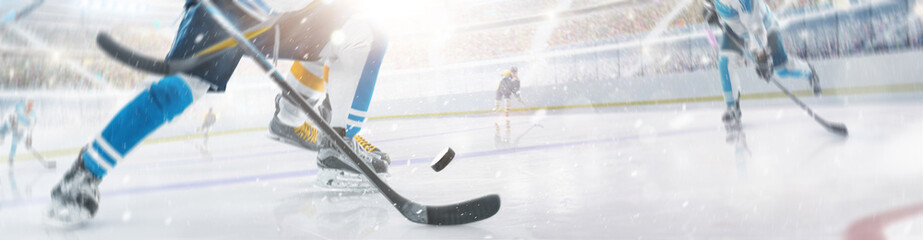 Focused on the hockey puck. Hockey action. Fight for the puck. Concept of action. Team sport game. Energy. Ad
