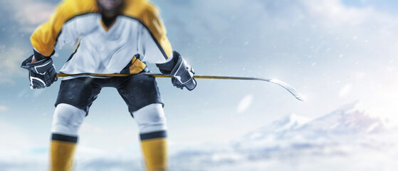 Professional hockey player. Focused on the hockey stick. Sports emotions.Hockey player in the helmet and gloves on outdoor