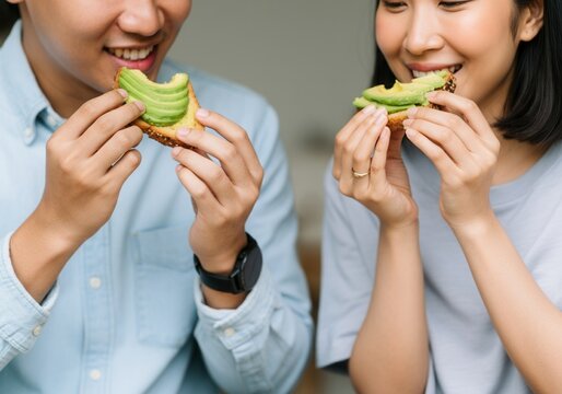Smiling couple enjoying avocado toast in casual setting