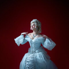Status. Vintage portrait of young graceful woman in image of medieval royal person in renaissance...