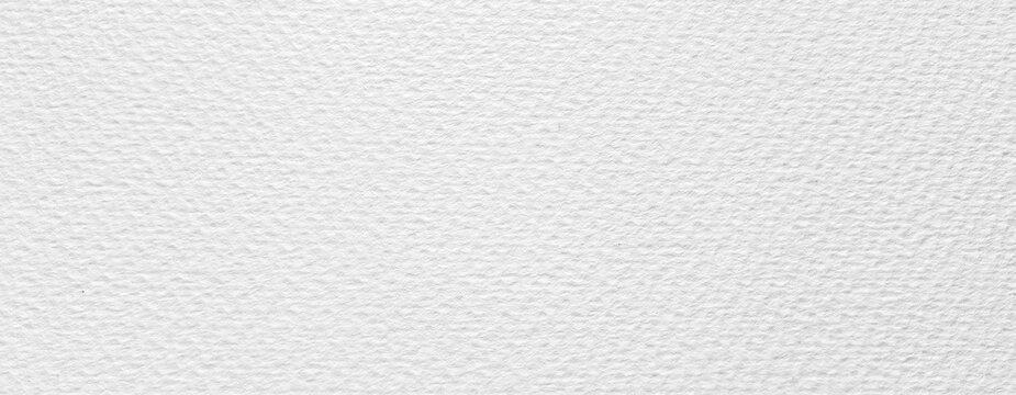 Detailed close-up of cold press watercolor paper with a textured, fibrous surface. Natural cotton feel with visible grain, perfect for use in print design, artistic backdrops, or digital mockups.