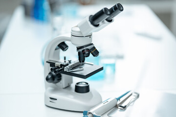 Laboratory microscope for scientific research in medical laboratory, biotechnology innovation, drug development, pharmaceutical diagnostics, health science, and microbiological analysis