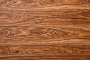 Fototapeta premium Wood Grain Texture: A captivating macro shot that beautifully showcases the intricate, natural patterns and warm tones of a wooden surface, ideal for design elements or textural backgrounds.