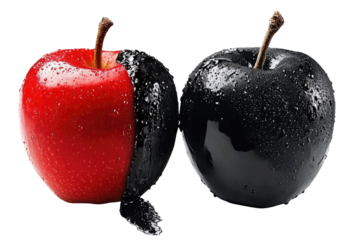 A red apple, half-coated in black, beside a completely black apple, both glistening with moisture