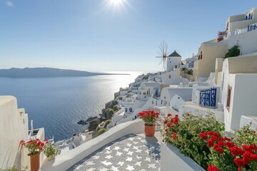 Oia Santorini's Iconic Windmill, White Buildings, Red Flowers, and Aegean Sea View