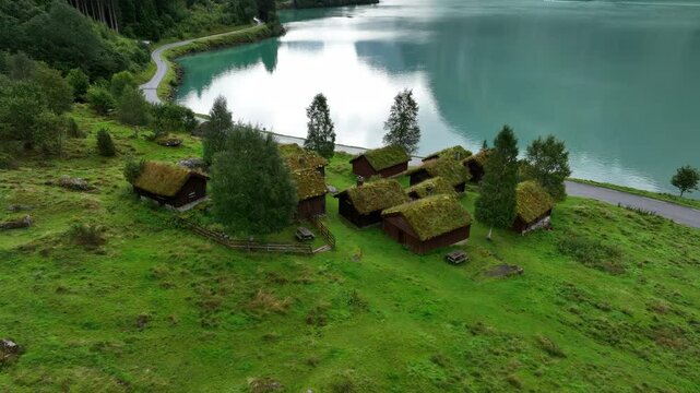 Beautiful drone shot of Breng Seter with shiny blue water, from Loen in Norway