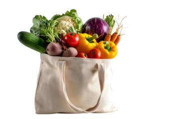 Assorted fresh vegetables in a canvas bag, white isolate background