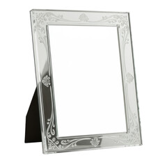 Elegant glass picture frame with an etched design on the edges stands on a black background