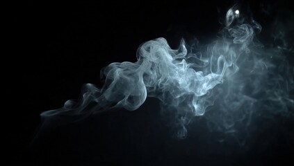 Fototapeta premium Wisps of white smoke swirl gracefully against a dark black background.