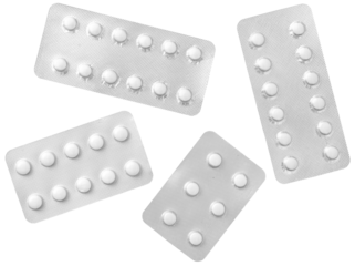 White pills in the plastic blister, isolated on white background, top view.