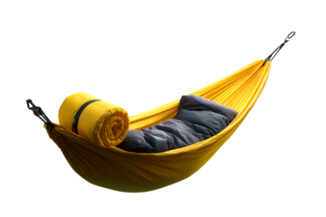 Cozy yellow hammock with blanket and pillow for relaxation at home