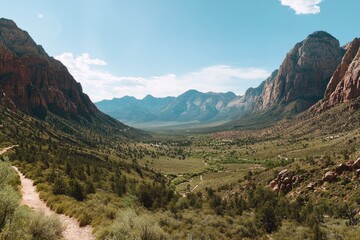 Naklejka premium Vast valley nestled amongst red rock mountains. A serene vista of a high desert canyon