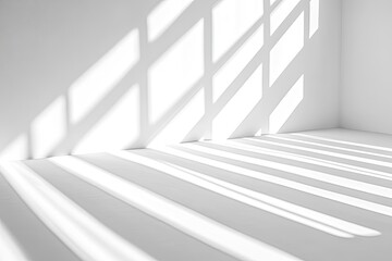Obraz premium Sunlight casts shadows on a minimalist white room