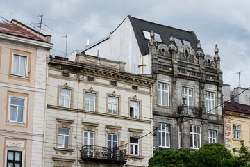 Historic urban architecture featuring ornate facades and classic building styles in Lviv, Ukraine.