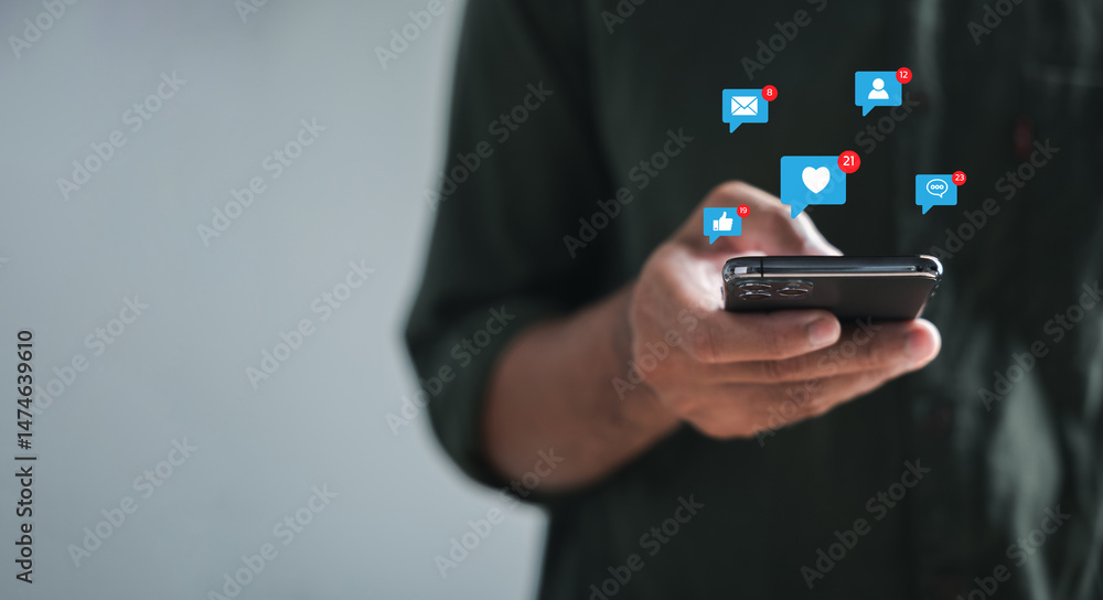 Poster using his smartphone, man types in live chat, embodying concepts of chatting and social networking. 