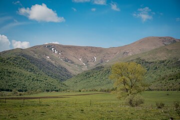 landscape with mountains and clouds