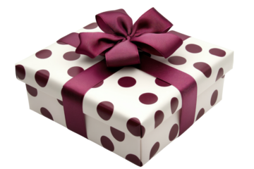 A gift box with polka dots and a ribbon