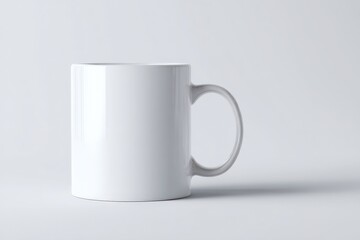 Obraz premium Blank white mug on a simple background.