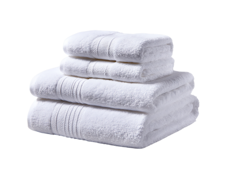 Stack of folded white towels on white isolated background.