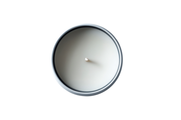 Top view of a white candle in a tin container isolated on a white background.