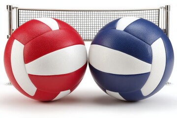 Two colorful volleyballs placed on a smooth surface in front of a sports net in a recreational setting during daytime
