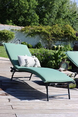  beach chair placed on a garden