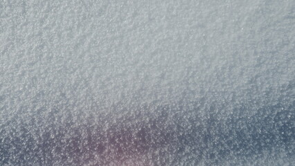 High-resolution image of a pristine snow texture. Perfect for winter backgrounds, holiday designs, and more.