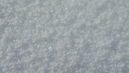 High-resolution image of snow crystals. Perfect for winter backgrounds and textures.
