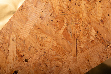 High-resolution image of particleboard, showing detailed wood chip texture and patterns. Ideal for...