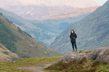 Woman in the mountains, glencoe, Scottish Highlands