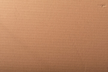High-resolution image of brown cardboard texture, perfect for backgrounds and design projects.